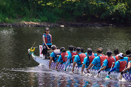  The Director of the HKETONY Candy Nip takes part in the races at the 44th Boston Hong Kong Dragon Boat Festival as the drummer for the HKETONY DragonRiders team.