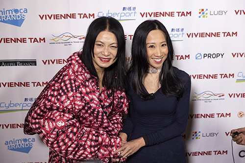  Director of HKETONY Candy Nip (right) congratulates designer Vivienne Tam on her latest collection. 